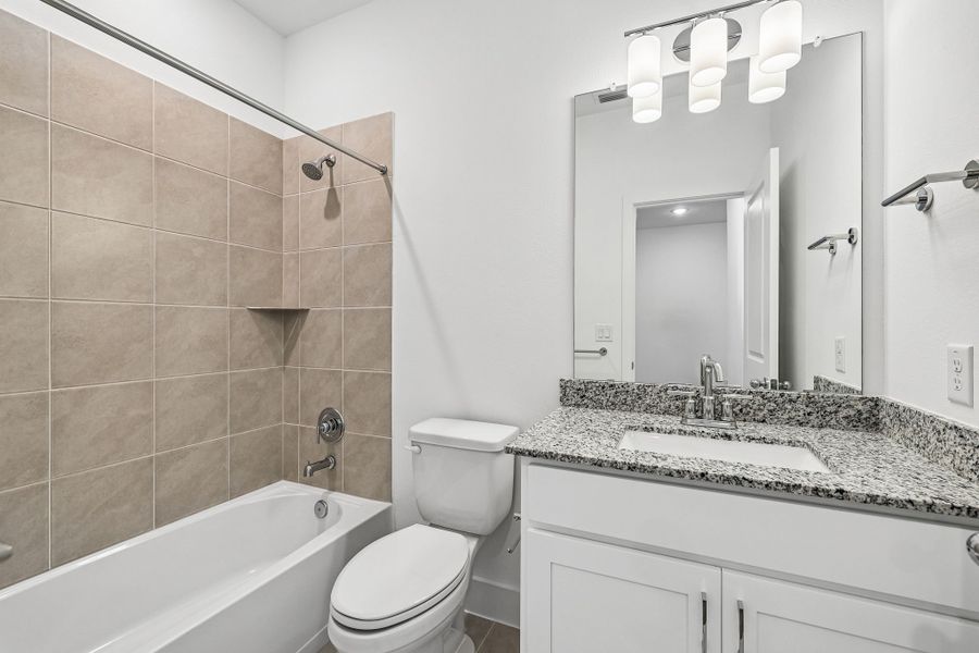 Furnished interior view inside a new home in Freedom at Anthem, Kyle (Image 12).