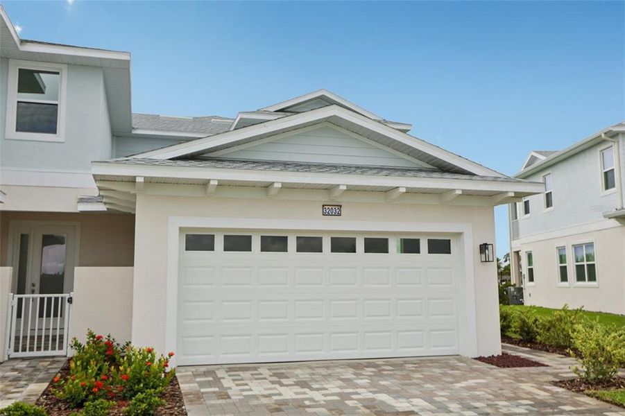 Exterior details and patio area of a home in Lagoon Residences at Epperson, Wesley Chapel (Image 3).