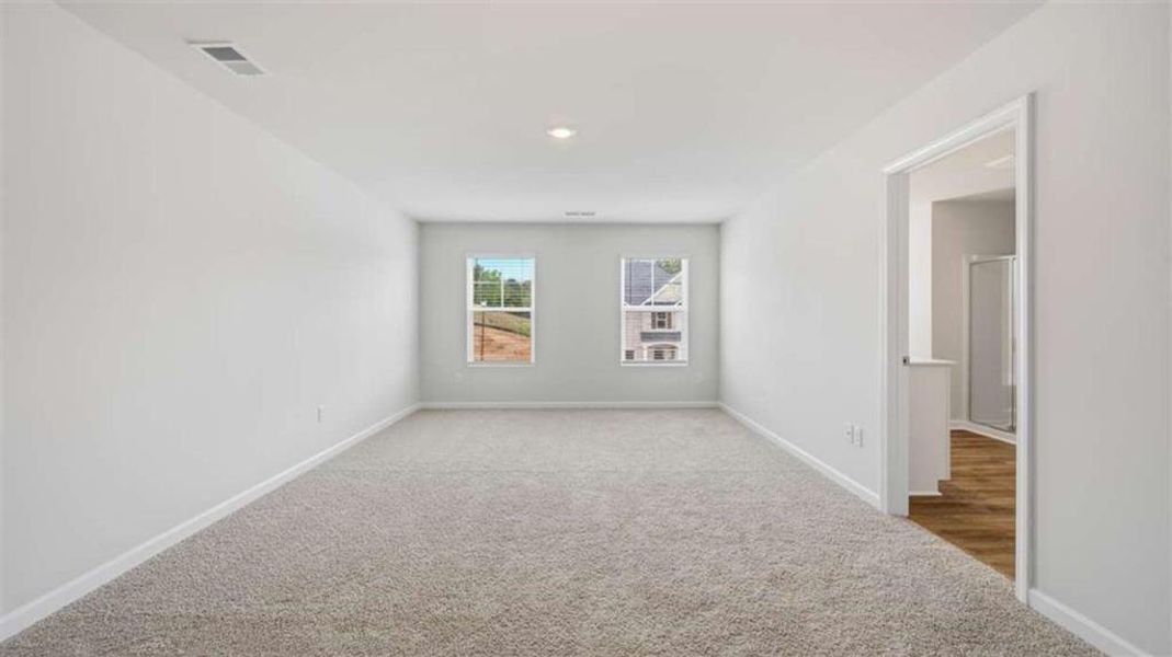 Spacious, unfurnished interior of a new home in Brooks Station, Dacula (Image 30).