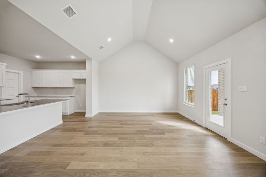 Living and Dining Rooms in the Masters home plan by Trophy Signature Homes – REPRESENTATIVE PHOTO