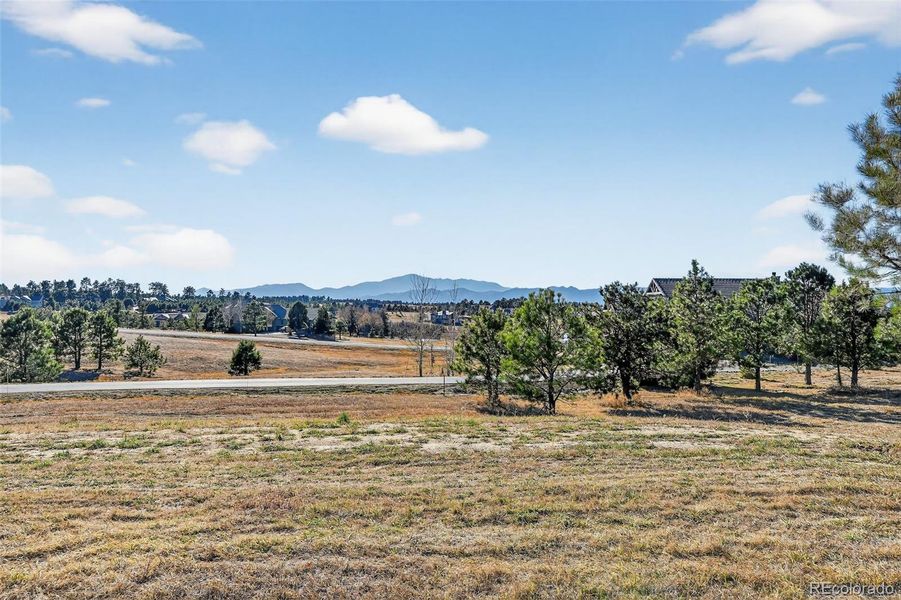 Looking west from wrap patio off Dining Room. Pikes Peak in the background.