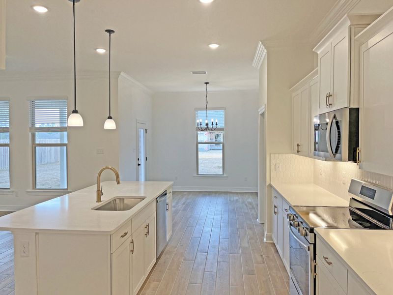 Furnished interior view inside a new home in Bird Song at Hammock Bay, Freeport (Image 9).