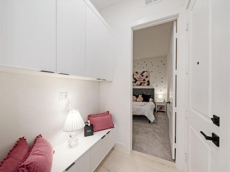 Mudroom featuring light wood-type flooring Mudroom featuring light wood-type flooring