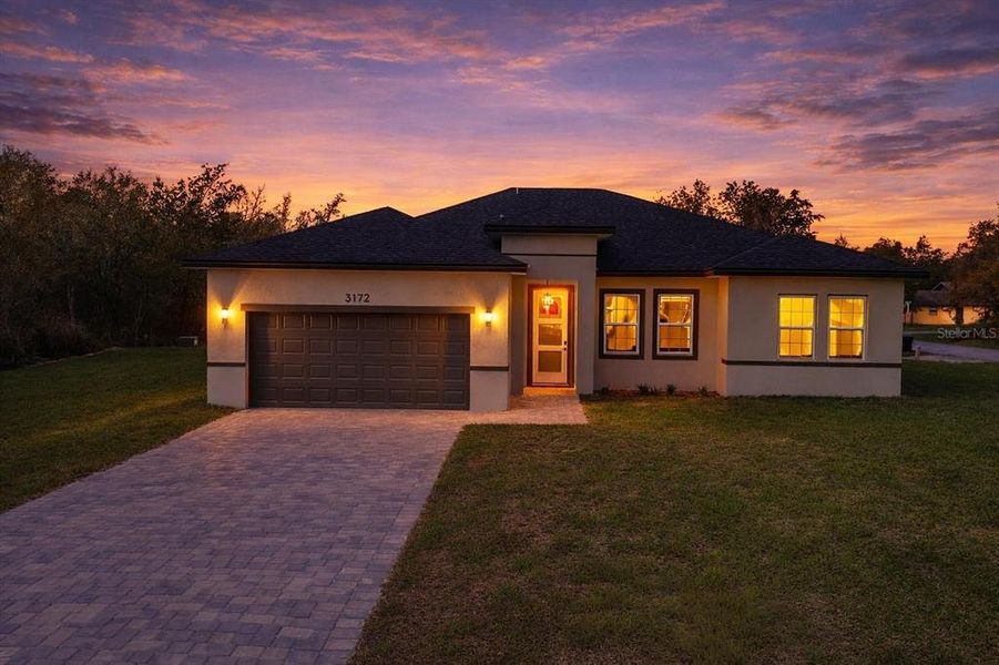 Front exterior of a new home in , Ocala, FL, highlighting curb appeal (Image 1). Front exterior of a new home in , Ocala, FL, highlighting curb appeal (Image 1).