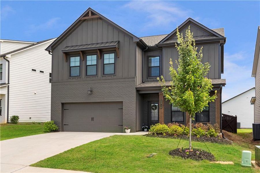 Front exterior of a new home in , Gainesville, GA, highlighting curb appeal (Image 2). Front exterior of a new home in , Gainesville, GA, highlighting curb appeal (Image 2).