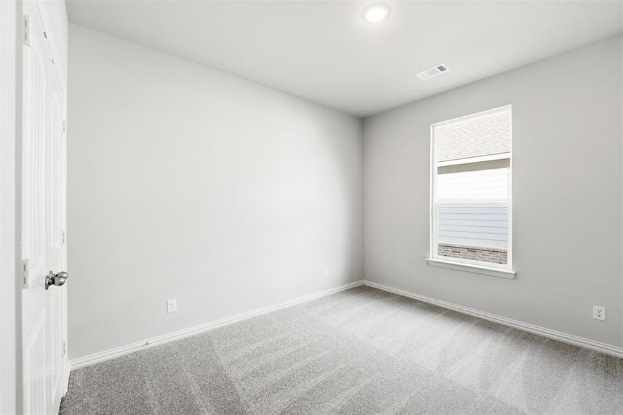 Unfurnished room featuring carpet and recessed lighting