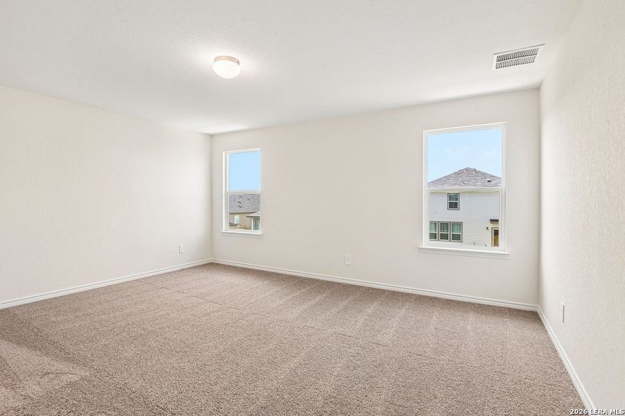 Spacious, unfurnished interior of a new home in Woodside Farms, Seguin (Image 30).