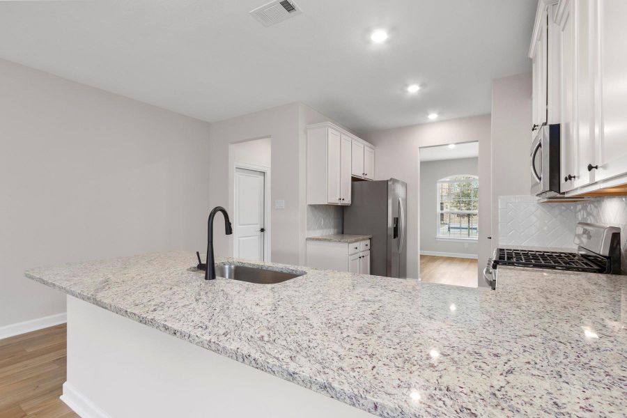 Furnished interior view inside a new home in Emberly, Beasley (Image 8).