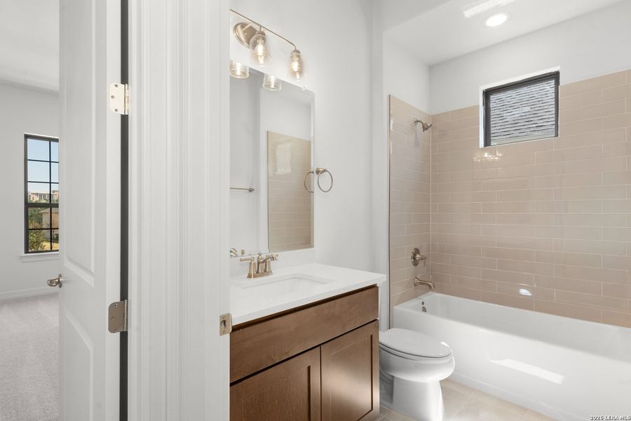 Furnished interior view inside a new home in El Sonido at Campanas, San Antonio (Image 8).