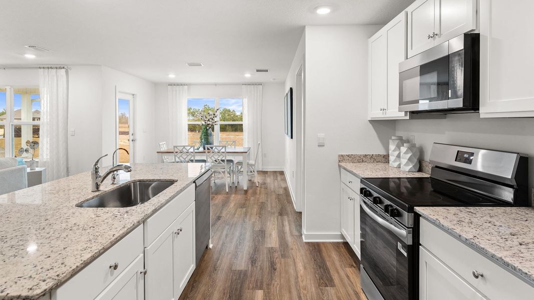 Furnished interior view inside a new home in Magnolia at the Bluffs Phase 3, Freeport (Image 11).