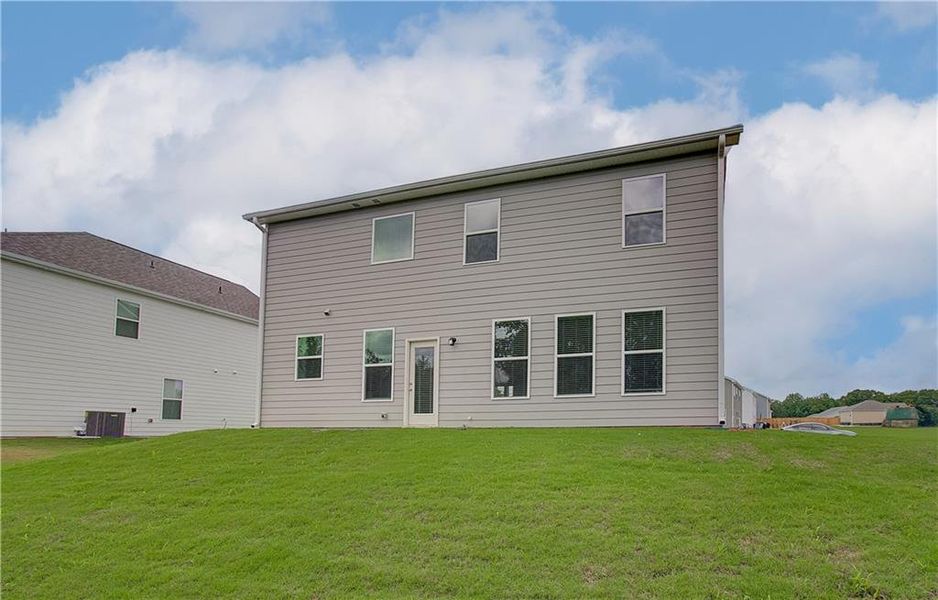 Front exterior of a new home in Chapel Hill, Newnan, GA, highlighting curb appeal (Image 2).