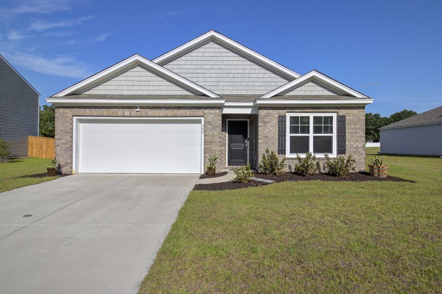 Front exterior of a new home in Stone Ridge, Moncks Corner, SC, highlighting curb appeal (Image 1). Front exterior of a new home in Stone Ridge, Moncks Corner, SC, highlighting curb appeal (Image 1).