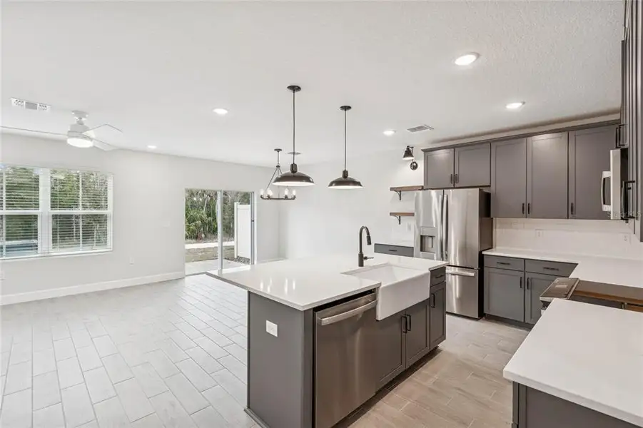 Furnished interior view inside a new home in Aspire at Canter Creek, Davenport (Image 4).