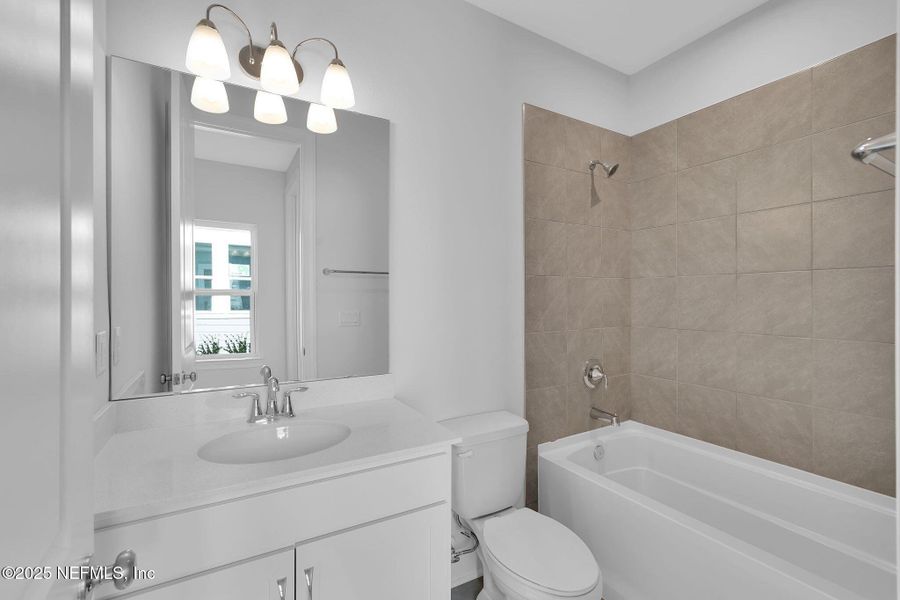 Furnished interior view inside a new home in Trailmark - Phase 10, St. Augustine (Image 6).