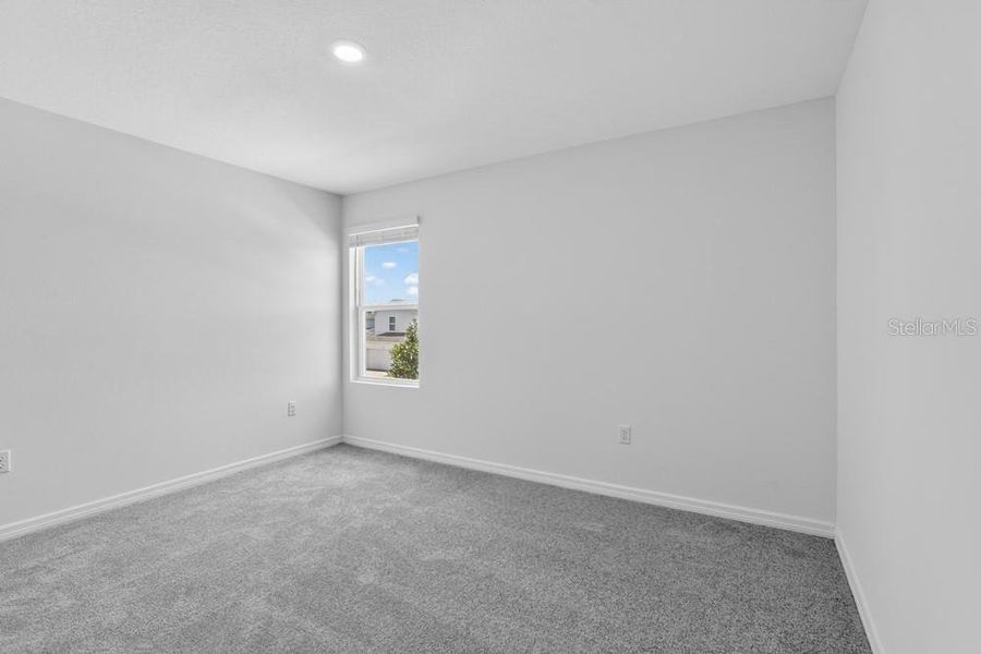 Spacious, unfurnished interior of a new home in Waterstone, Groveland (Image 29).