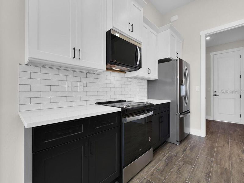 Furnished interior view inside a new home in , Port Charlotte (Image 6). Furnished interior view inside a new home in , Port Charlotte (Image 6).