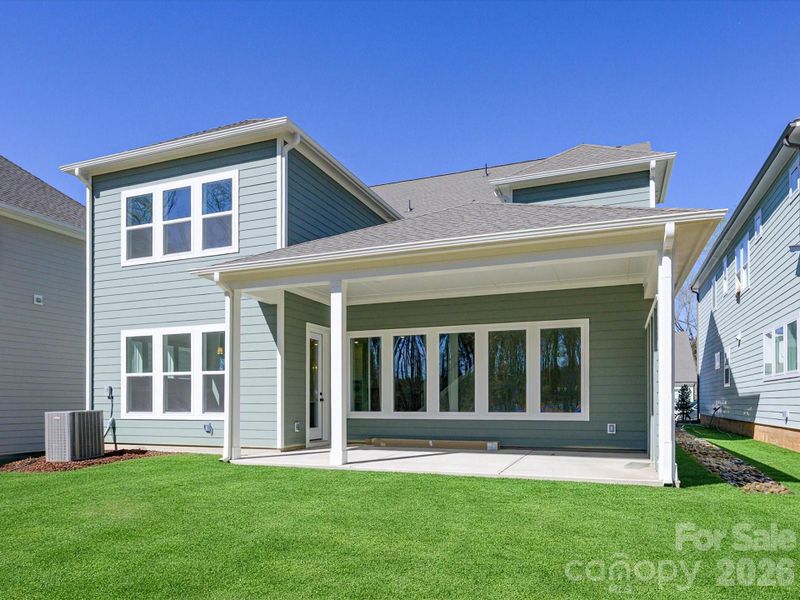 Exterior details and patio area of a home in North Creek Village, Huntersville (Image 23).