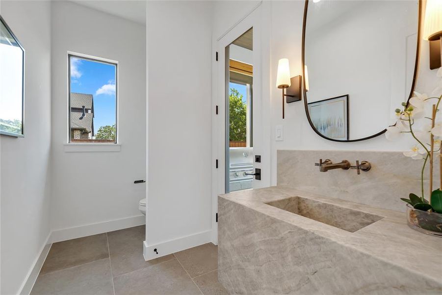 Bathroom with tile patterned floors and vanity Bathroom with tile patterned floors and vanity