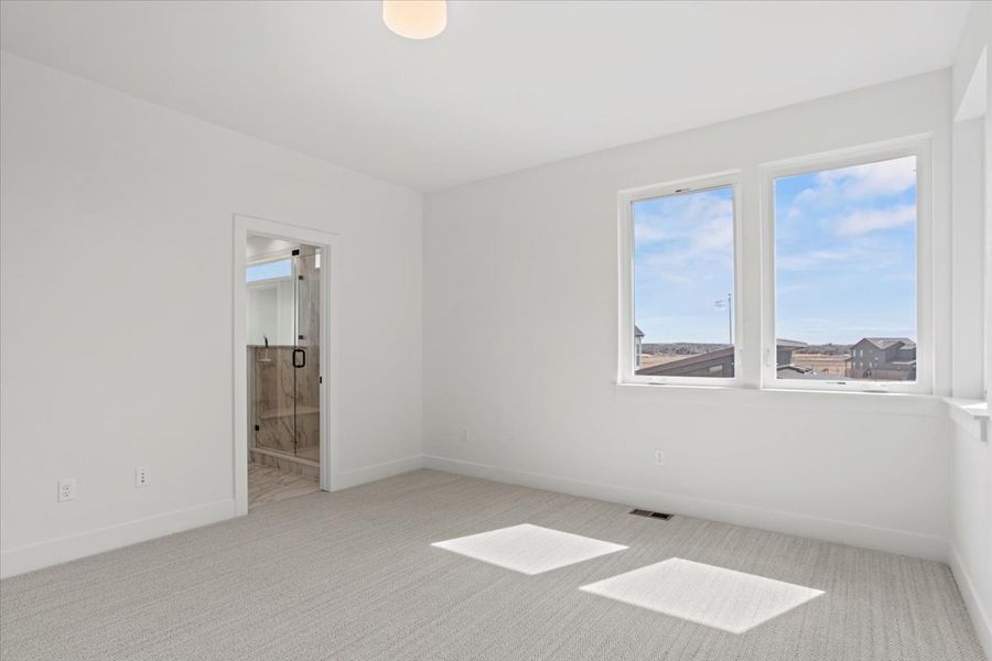 Spacious, unfurnished interior of a new home in West Grange, Longmont (Image 34).