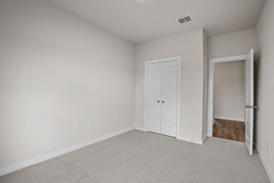 Representative unfurnished interior of a home built from the Waterford III by Cheldan Homes in Stoneview, Glen Rose (Image 42).