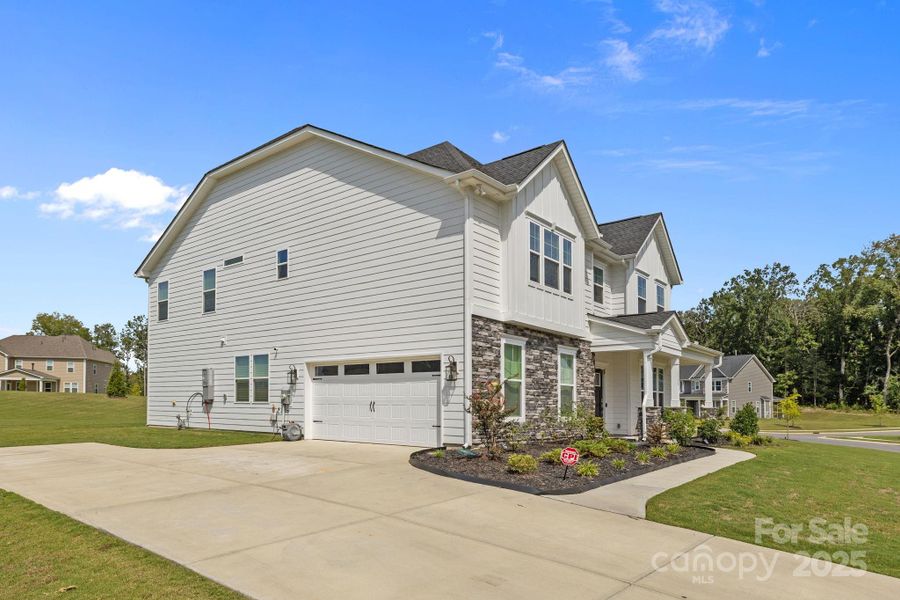 Front exterior of a new home in , Indian Trail, NC, highlighting curb appeal (Image 26).