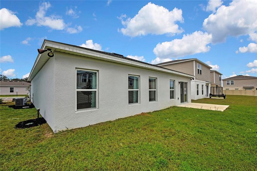 Exterior details and patio area of a home in , Sumterville (Image 33).
