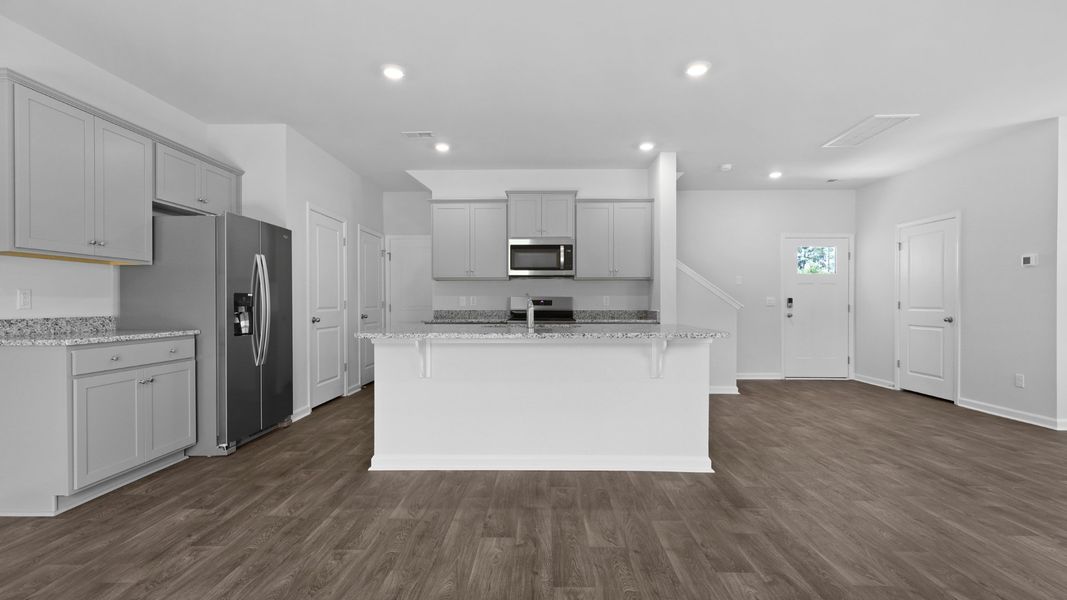 Representative unfurnished interior of a home built from the Aisle by D.R. Horton in Pine Hills at Cane Bay, Summerville (Image 11).