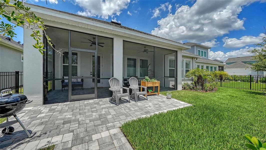 Exterior details and patio area of a home in Emerald Landing at Waterside at Lakewood Ranch – Lake Series, Sarasota (Image 28).
