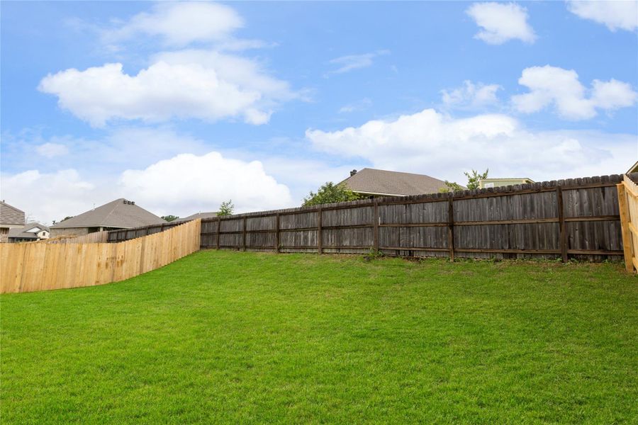Exterior details and patio area of a home in Vintage Farms, Brenham (Image 4).