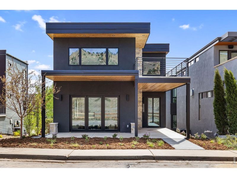 Front exterior of a new home in , Boulder, CO, highlighting curb appeal (Image 21).