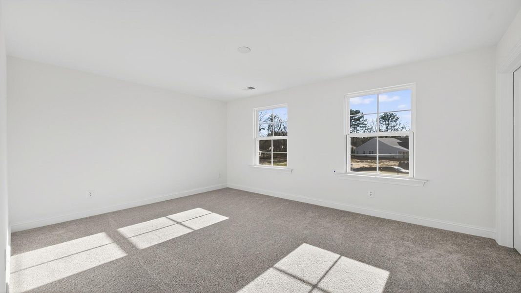 Spacious, unfurnished interior of a new home in Creekside at Andrews, Summerville (Image 21).