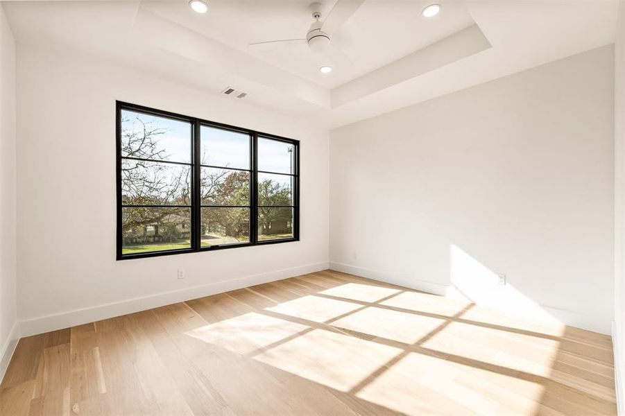 Upstairs guest bedrooms are generously sized, with layouts that easily accommodate different furniture arrangements