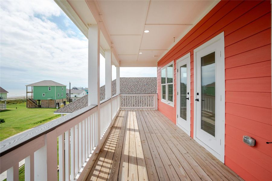 Spacious covered deck with tons of beach views all around!