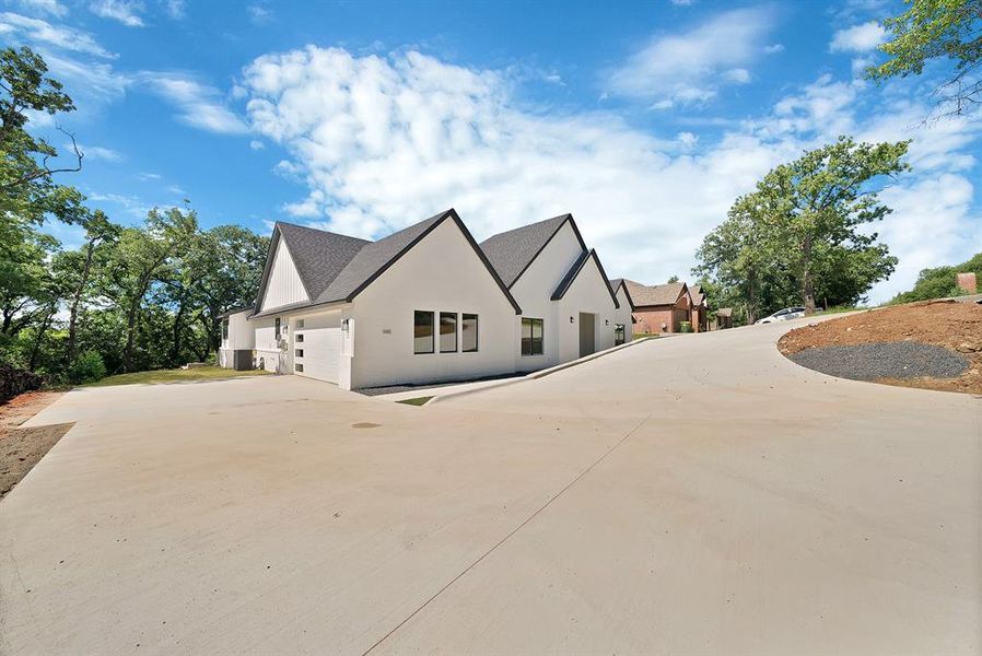 Front exterior of a new home in , Joshua, TX, highlighting curb appeal (Image 22).