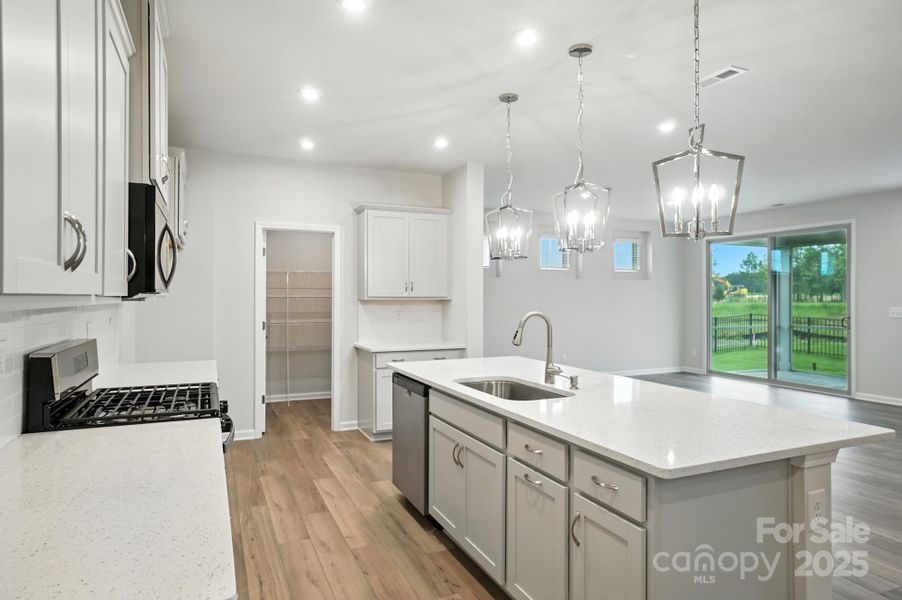 Furnished interior view inside a new home in Waxhaw Landing, Monroe (Image 8).