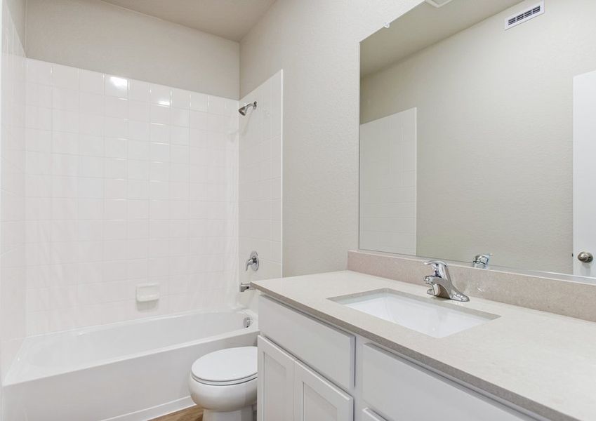 The secondary bathroom has a tub/shower combo.