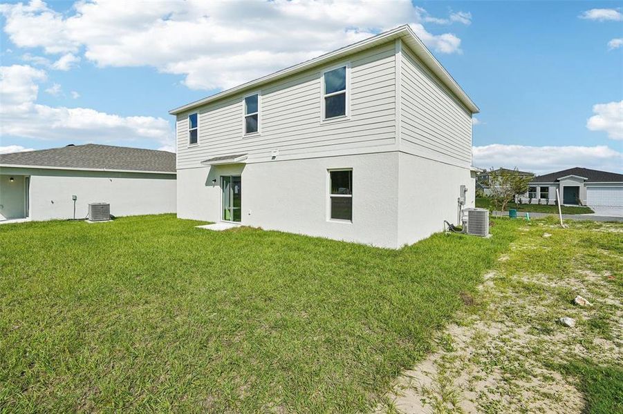 Exterior details and patio area of a home in West Oak, Ocala (Image 6).