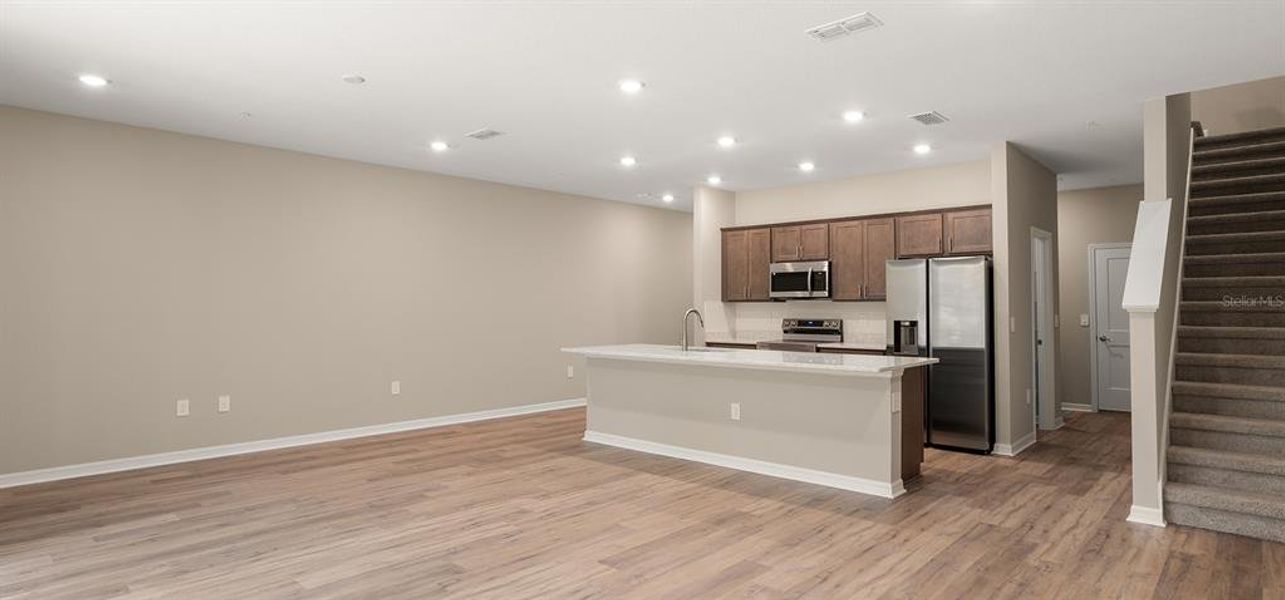 Furnished interior view inside a new home in , St. Cloud (Image 12).