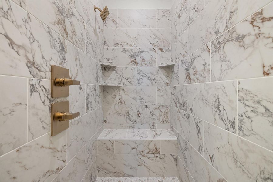 Bathroom view of tiled shower