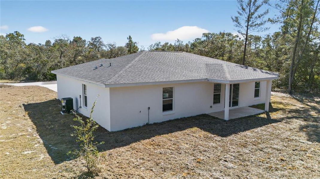 Exterior details and patio area of a home in , Ocklawaha (Image 4).