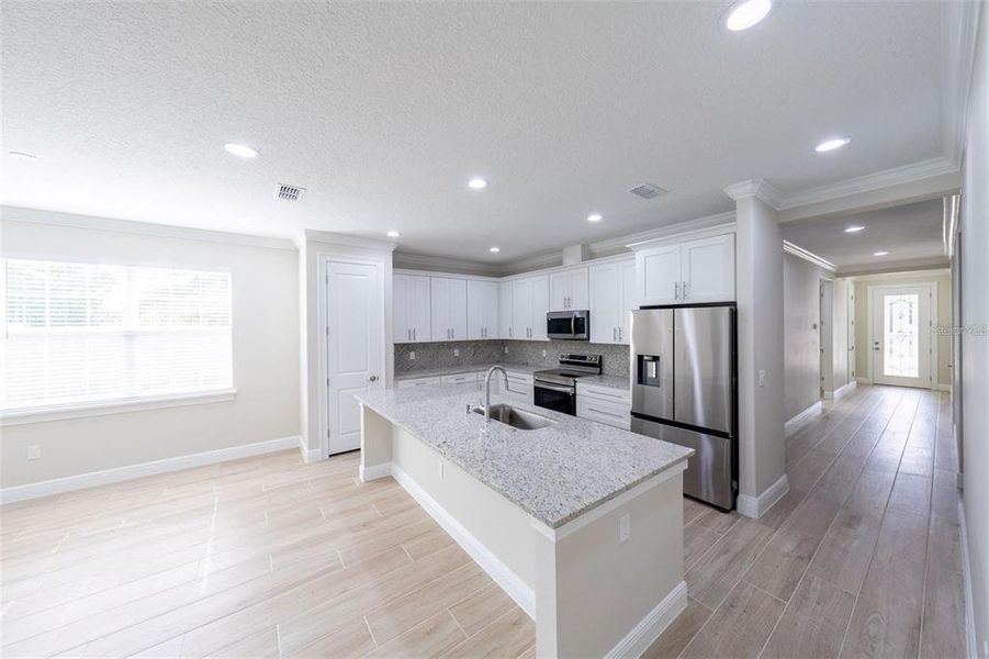 Furnished interior view inside a new home in , Summerfield (Image 14).