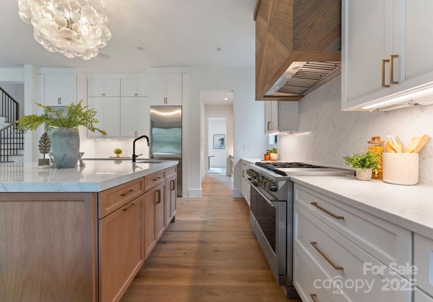 Marsh Cabinetry cabinets throughout, with floor to ceiling cabinets in kitchen and butler pantry Marsh Cabinetry cabinets throughout, with floor to ceiling cabinets in kitchen and butler pantry