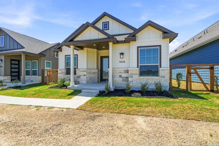 Front exterior of a new home in The Crossvine, Schertz, TX, highlighting curb appeal (Image 23).