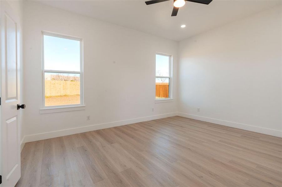 Private split-bedroom design with a spacious primary suite, high ceilings, and beautiful natural light.