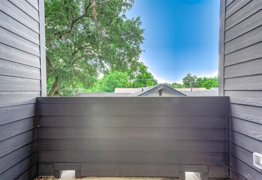 Exterior details and patio area of a home in , Houston (Image 2). Exterior details and patio area of a home in , Houston (Image 2).