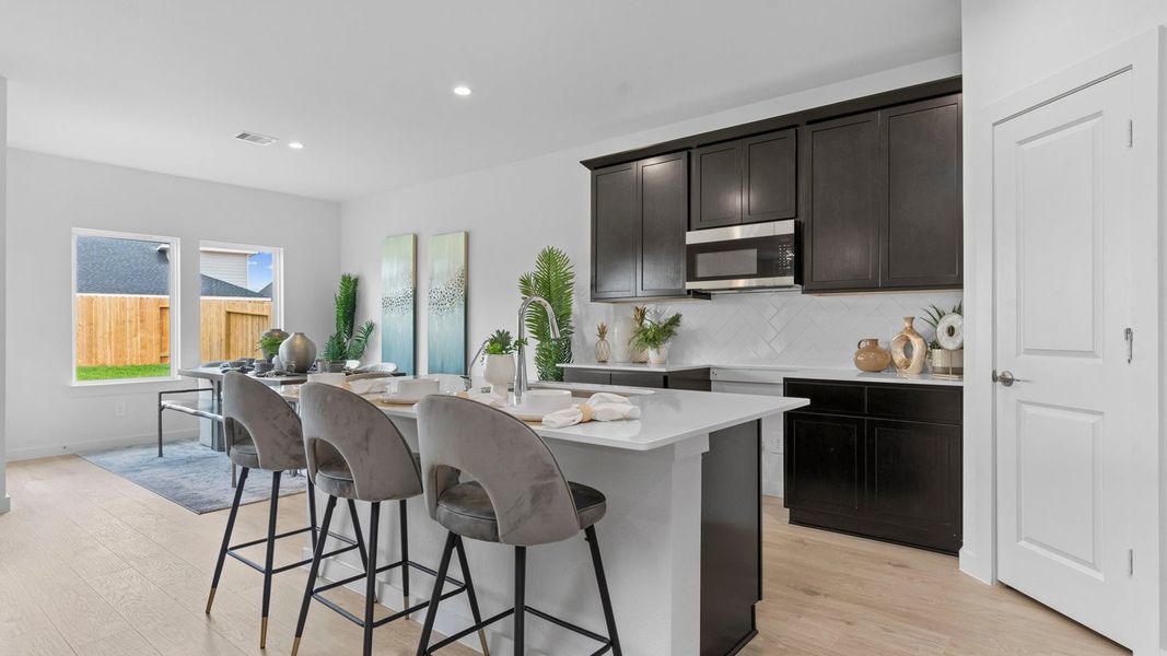 Furnished interior view inside a new home in Tamarron, Fulshear (Image 11).