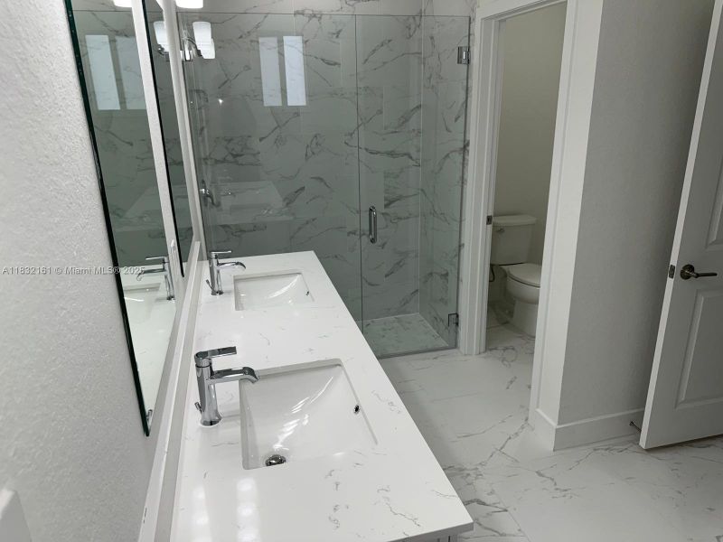 Furnished interior view inside a new home in , Homestead (Image 4). Furnished interior view inside a new home in , Homestead (Image 4).