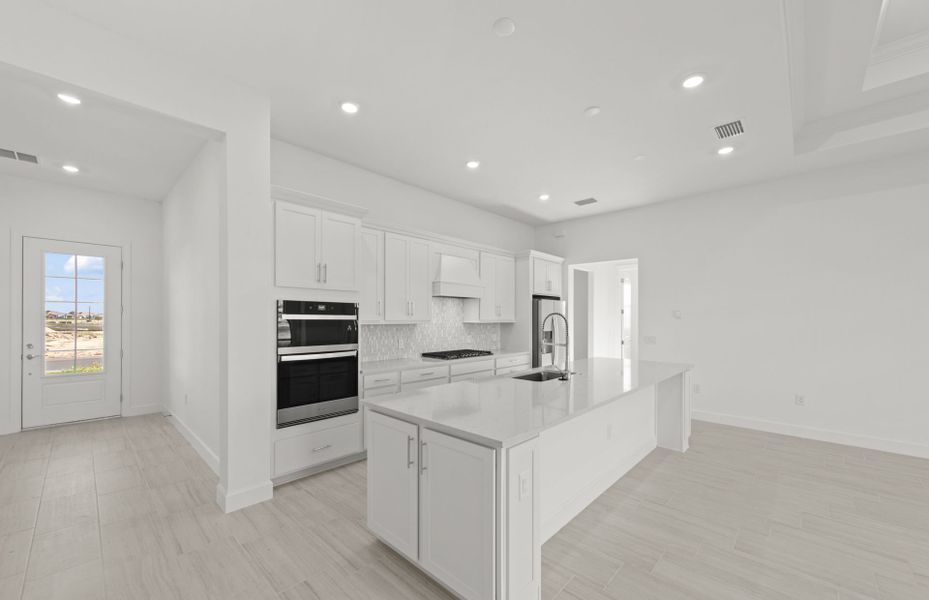 Furnished interior view inside a new home in TerraWalk at Babcock Ranch, Alva (Image 6).