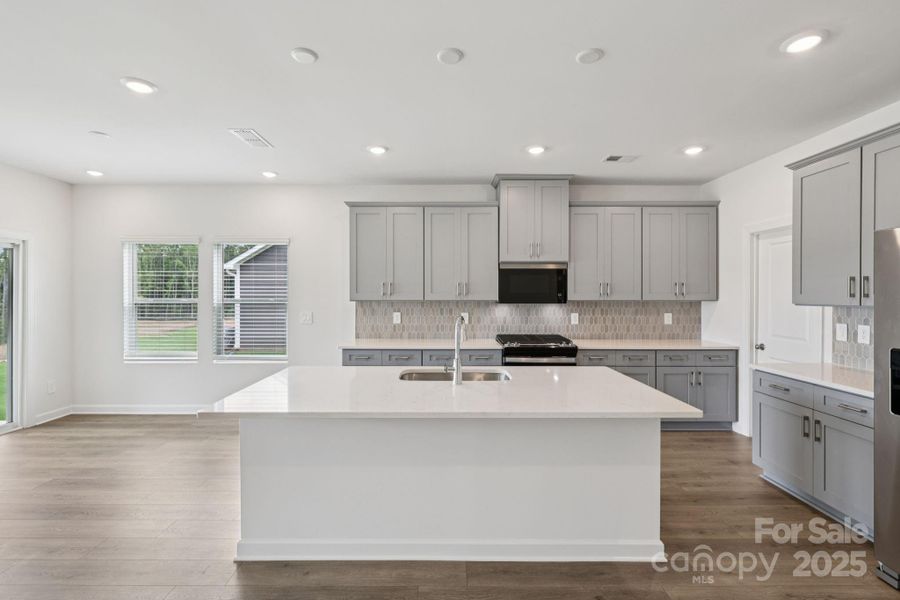 Photo is not of the actual home, but is an inspirational photo of builder’s model home and may depict options, furnishings, and/or decorator features that are not included