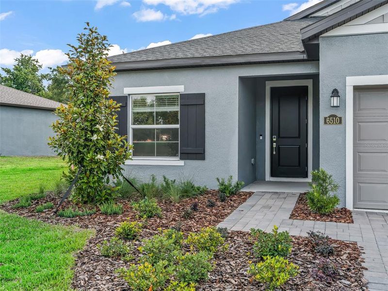 Exterior details and patio area of a home in Juliette Falls, Dunnellon (Image 31).